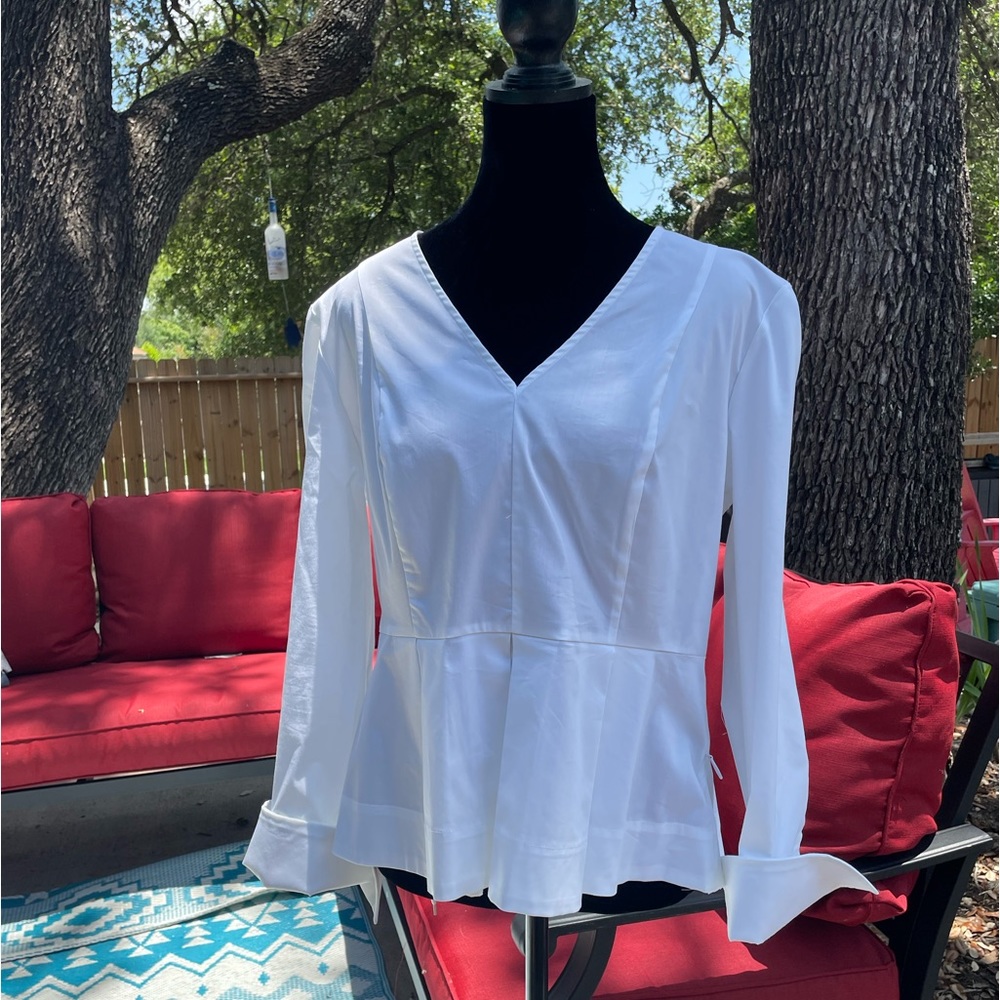 White peplum top